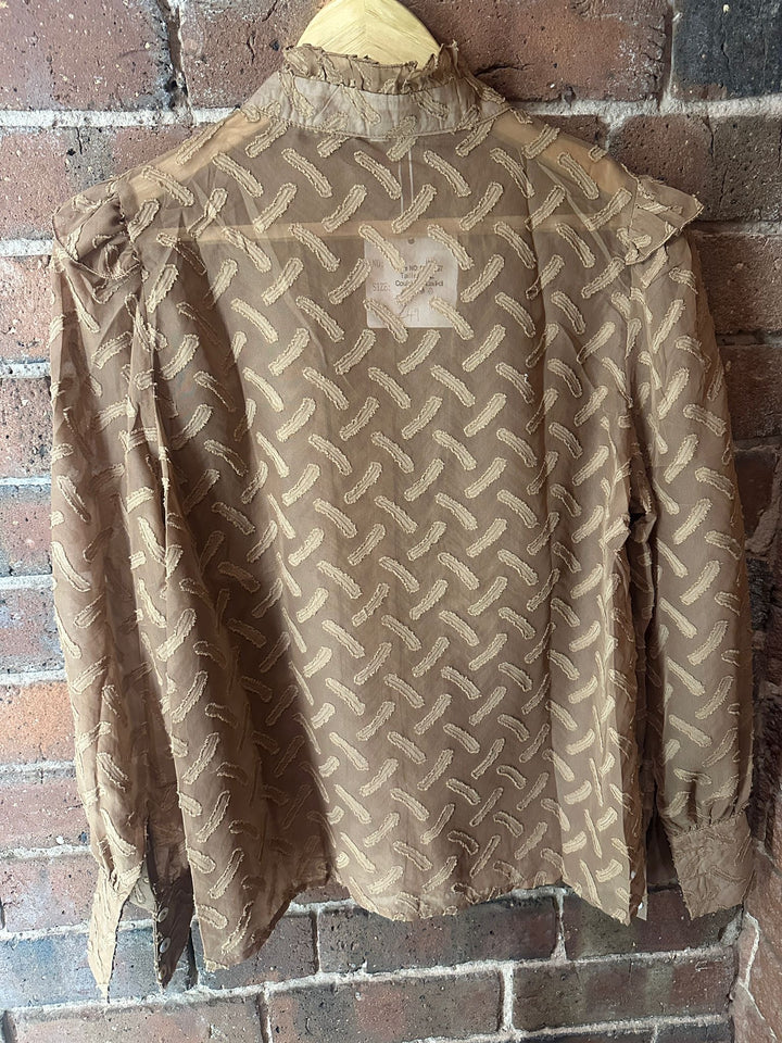 tan frill blouse